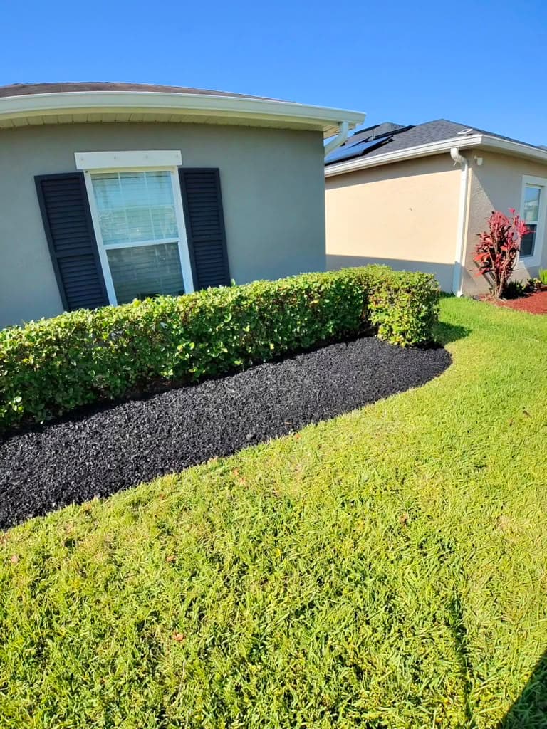Fresh mulch bed installed by Flightline